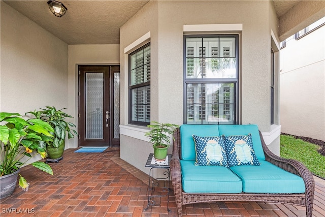 doorway to property with a porch