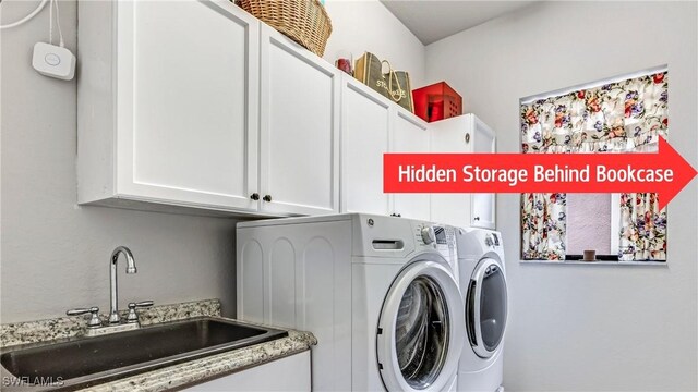 clothes washing area with washer and dryer, sink, and cabinets