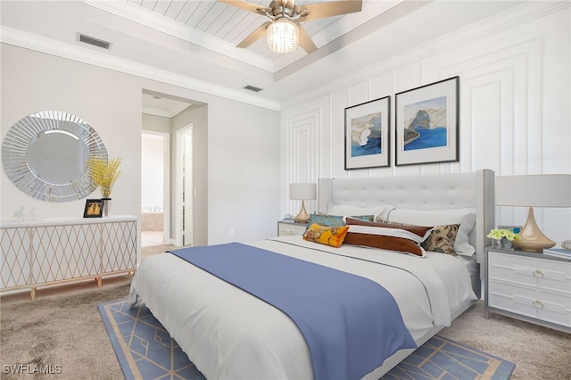 bedroom featuring carpet, ceiling fan, and ornamental molding