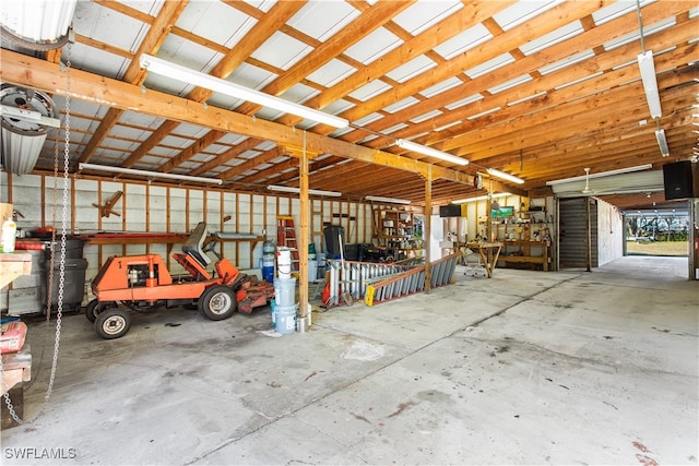 garage with a workshop area