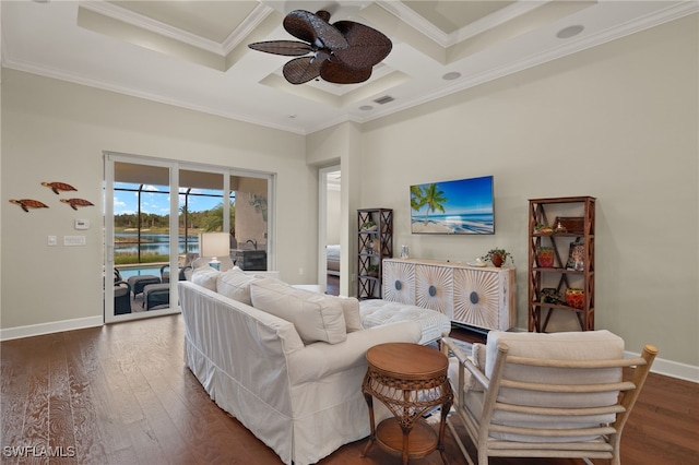 living room featuring ceiling fan, coffered ceiling, beamed ceiling, dark hardwood / wood-style floors, and ornamental molding