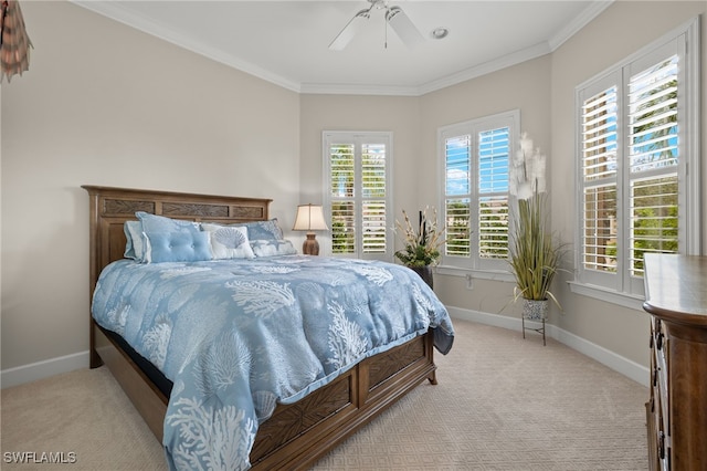 bedroom featuring light carpet, ceiling fan, and ornamental molding