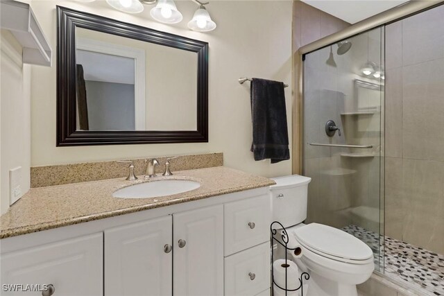 2600 Poinciana St, Naples, FL 34105 - full bath with toilet, a stall shower, and vanity