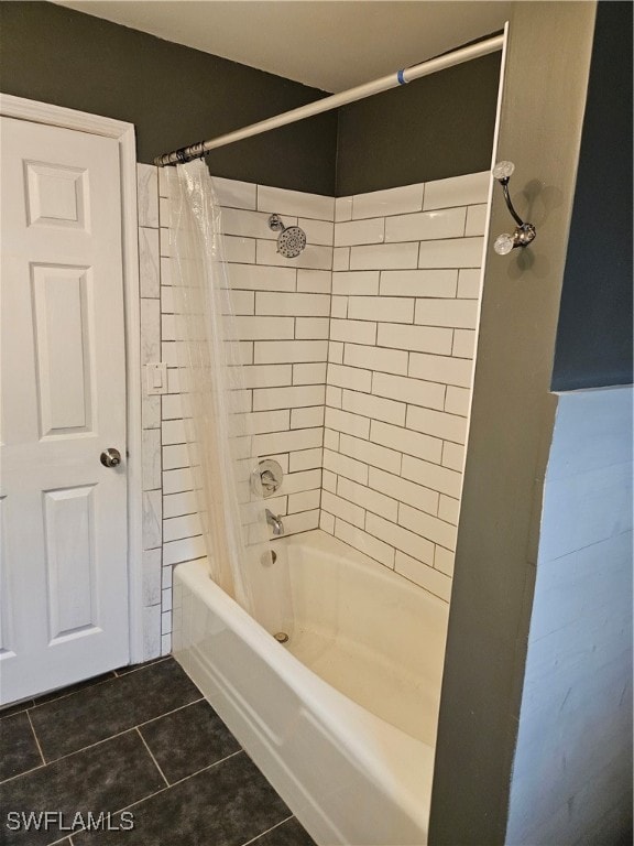 bathroom featuring tile patterned flooring and shower / bath combo with shower curtain