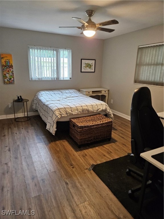 bedroom featuring ceiling fan and wood-type flooring