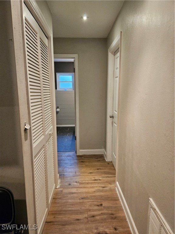 corridor featuring light wood-type flooring