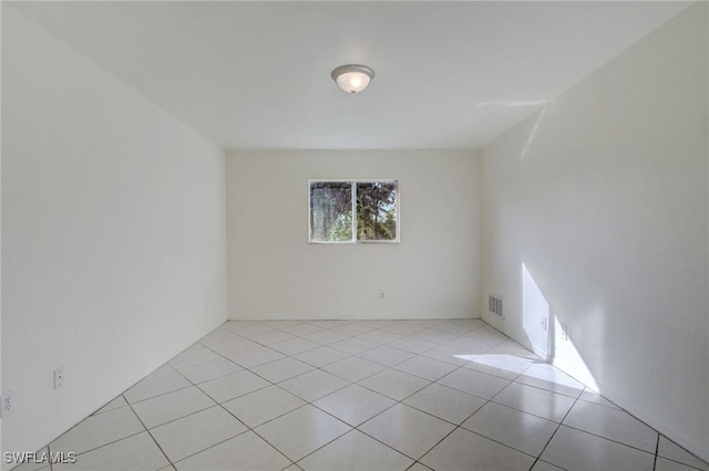 934 Garnet Ave, Lehigh Acres, FL 33974 - unfurnished room with light tile patterned flooring