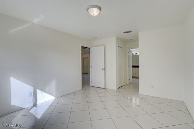 view of tiled spare room