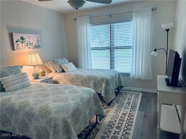 bedroom featuring wood-type flooring