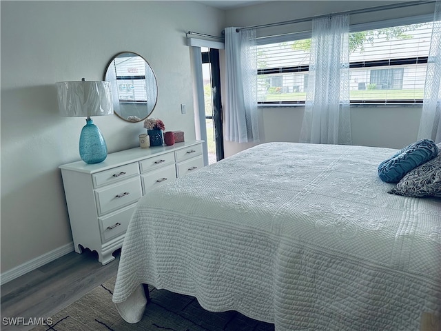 bedroom with wood-type flooring