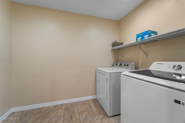 laundry room with separate washer and dryer