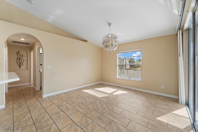 unfurnished dining area featuring light tile patterned flooring, vaulted ceiling, and a notable chandelier