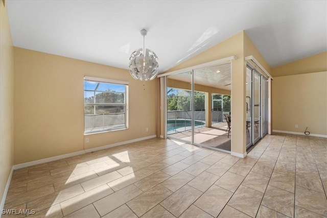 unfurnished dining area featuring plenty of natural light, light tile patterned flooring, vaulted ceiling, and a notable chandelier