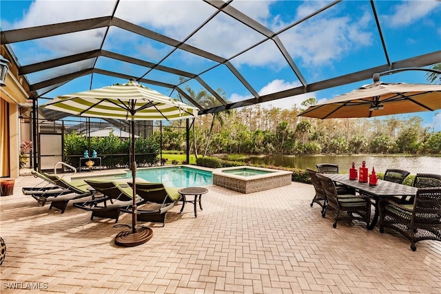 view of patio with a water view, a lanai, and a pool with hot tub