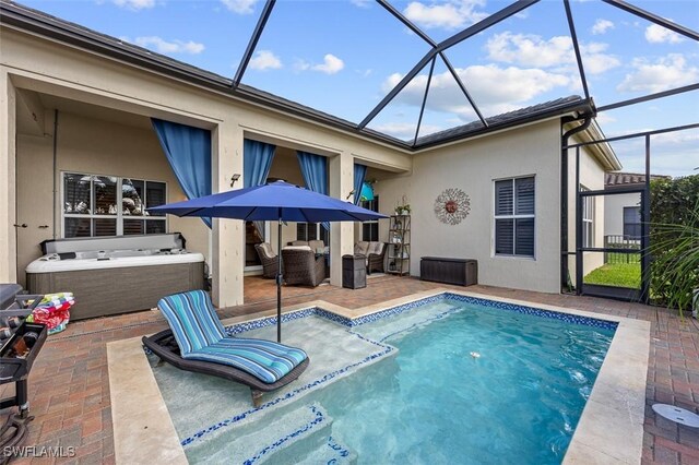 view of swimming pool with a patio area, outdoor lounge area, and glass enclosure