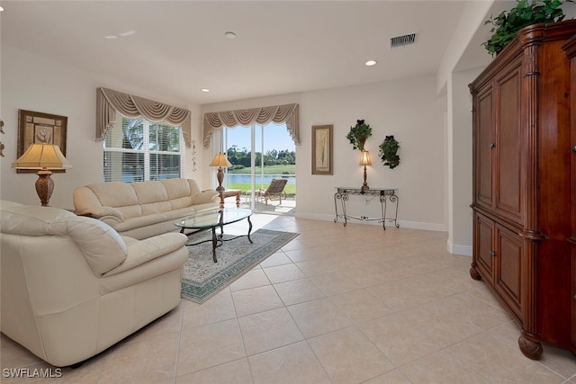 living room with light tile patterned floors