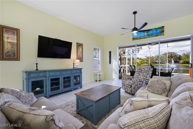 tiled living room with ceiling fan