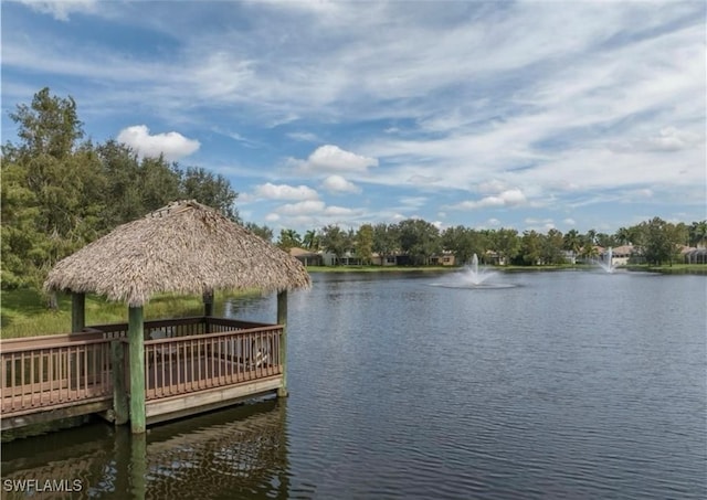 dock area featuring a gazebo and a water view