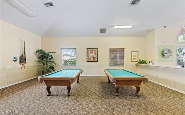 rec room featuring carpet, vaulted ceiling, and a healthy amount of sunlight