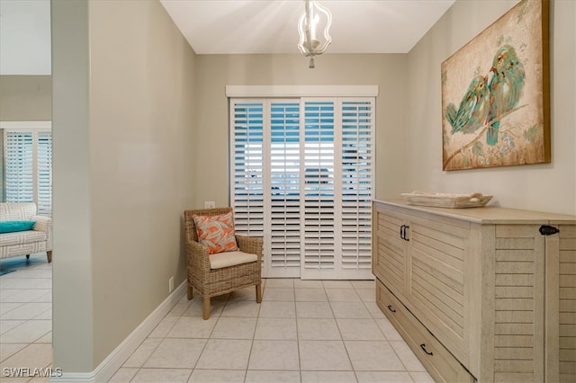 sitting room featuring light tile patterned floors