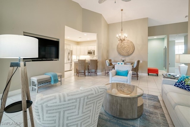 tiled living room featuring an inviting chandelier