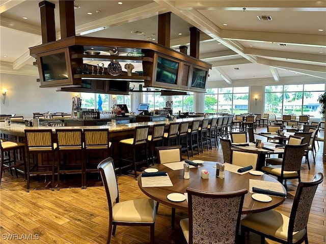 dining space with light hardwood / wood-style floors