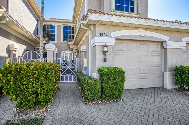 property entrance with a garage