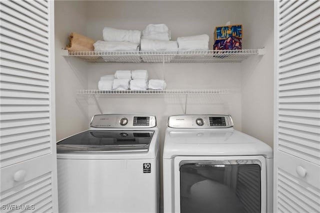 laundry room with laundry area and washer and dryer