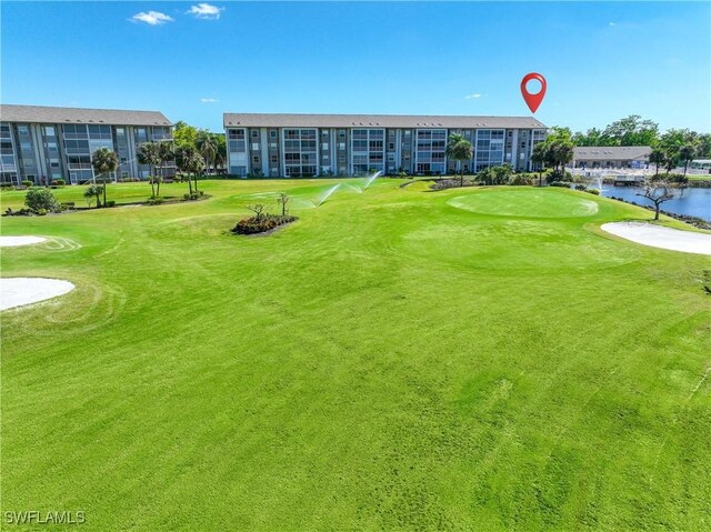 14871 Hole In 1 Cir Unit Ph1, Fort Myers, FL 33919 - surrounding community featuring view of golf course and a water view