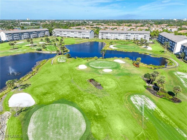 14871 Hole In 1 Cir Unit Ph1, Fort Myers, FL 33919 - drone / aerial view of apartment complex, a local golf course, and a nearby body of water