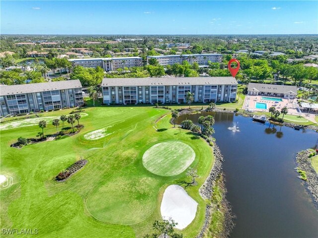 14871 Hole In 1 Cir Unit Ph1, Fort Myers, FL 33919 - drone / aerial view of apartment complex, a local golf course, and a large body of water