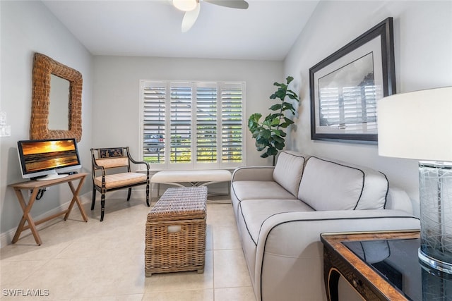 living room featuring ceiling fan, light tile patterned flooring, and vaulted ceiling