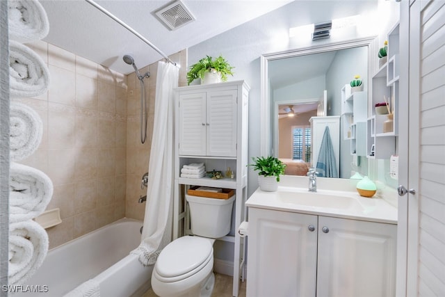 full bathroom with shower / bath combo, a textured ceiling, vaulted ceiling, toilet, and vanity