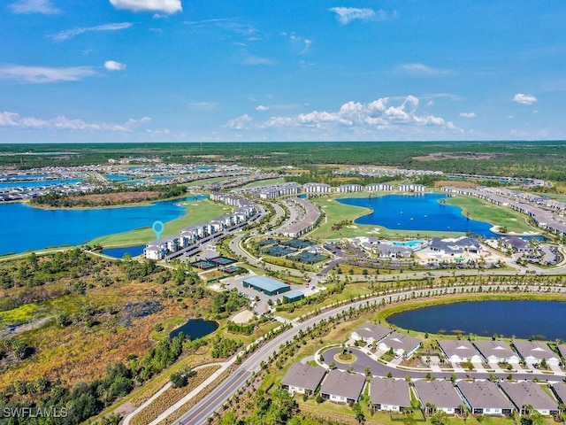 birds eye view of property featuring a water view