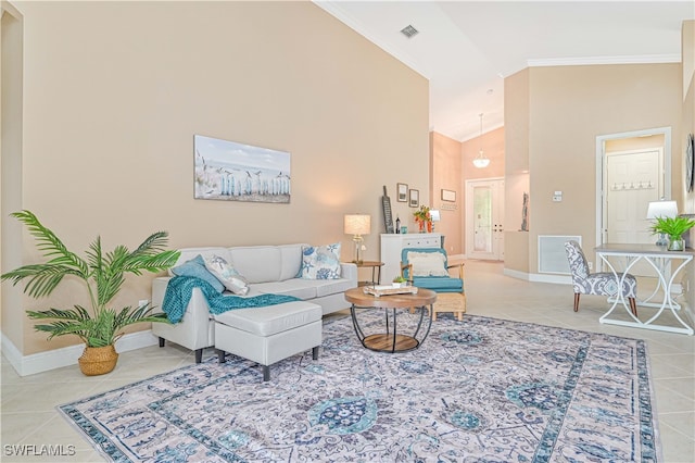 tiled living room featuring high vaulted ceiling and ornamental molding