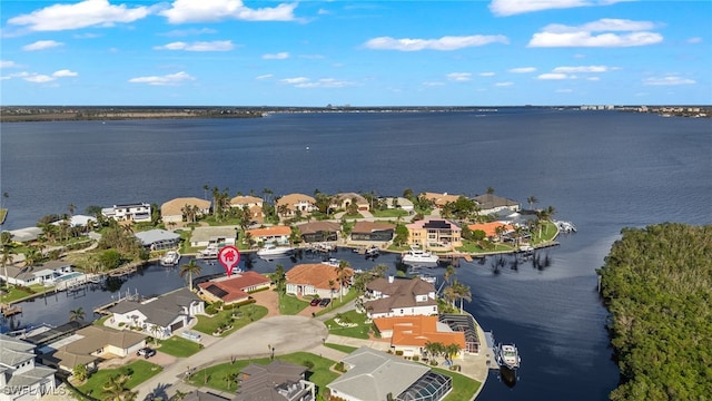 drone / aerial view featuring a water view