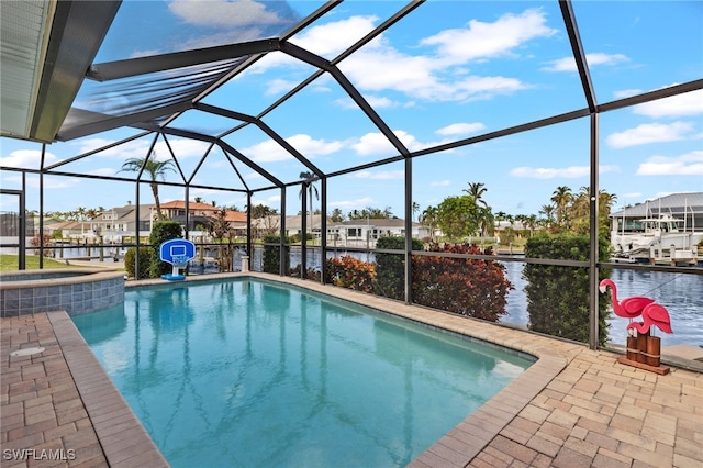 view of pool with a water view and a lanai