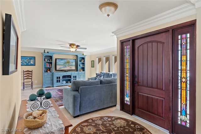 foyer entrance featuring light tile patterned floors, ceiling fan, and ornamental molding