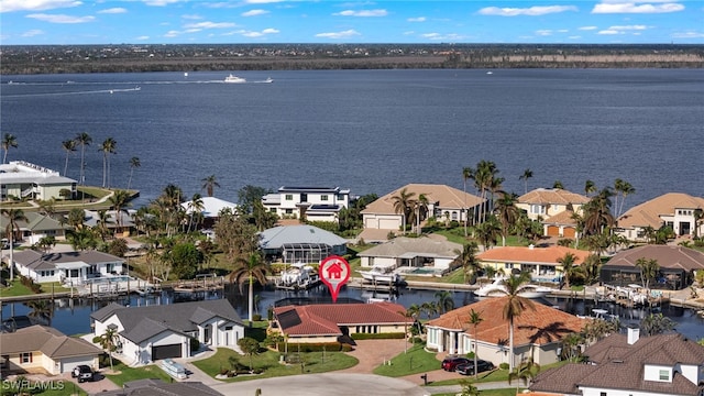 drone / aerial view featuring a water view