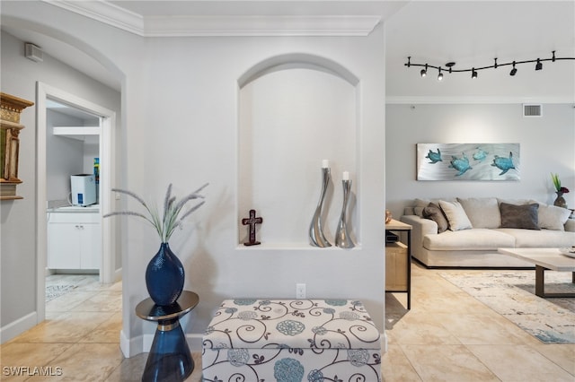 bathroom with tile patterned floors and ornamental molding