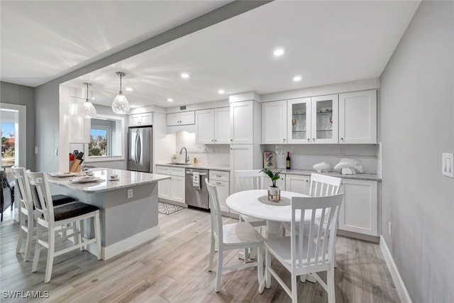 kitchen featuring white cabinets and stainless steel appliances