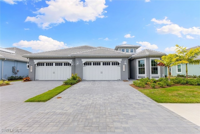 prairie-style house featuring a garage