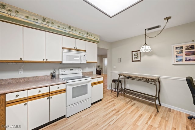 kitchen featuring white cabinetry, white appliances, pendant lighting, and light wood-type flooring