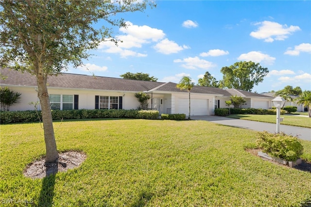 single story home with a front lawn and a garage