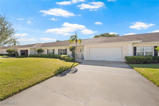 single story home featuring a front yard and a garage