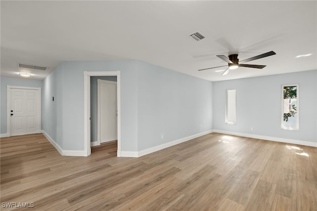 spare room featuring ceiling fan and light hardwood / wood-style floors