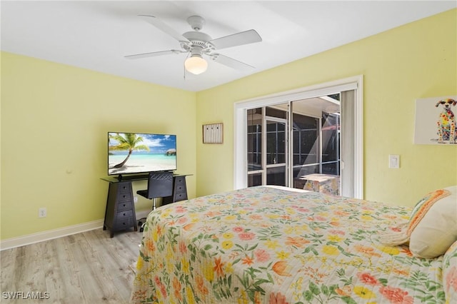 bedroom with access to exterior, light hardwood / wood-style floors, and ceiling fan