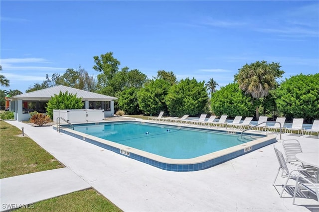 view of pool featuring a patio area