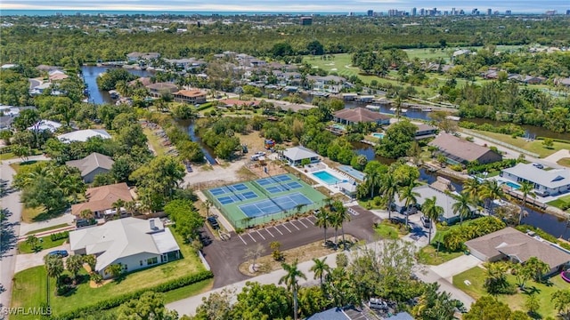 birds eye view of property featuring a water view