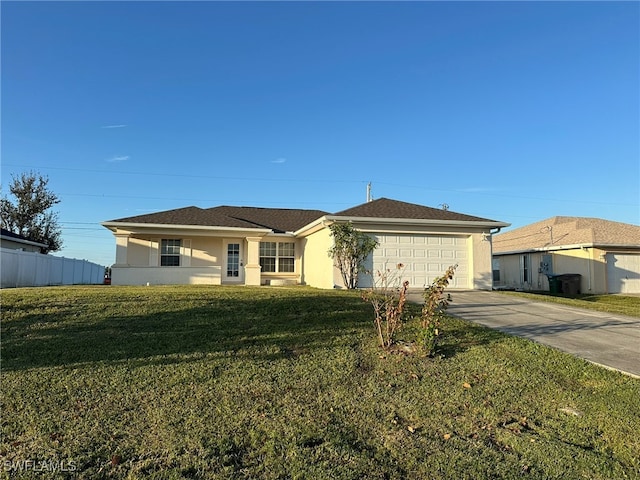 ranch-style home with a front yard and a garage